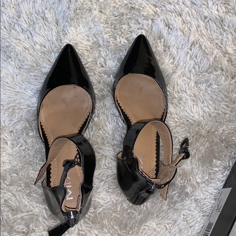 Black patent leather pumps